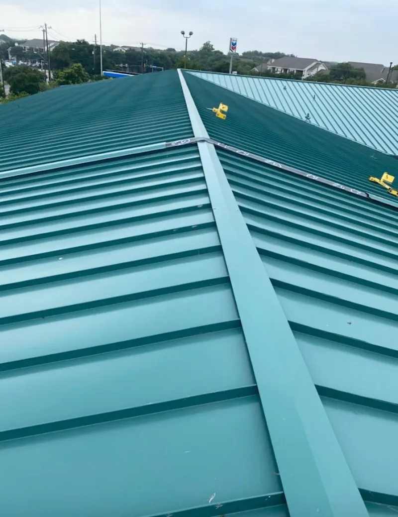 Green commercial metal roof ridge and valley for Metal Roof Repair in Spring Ridge